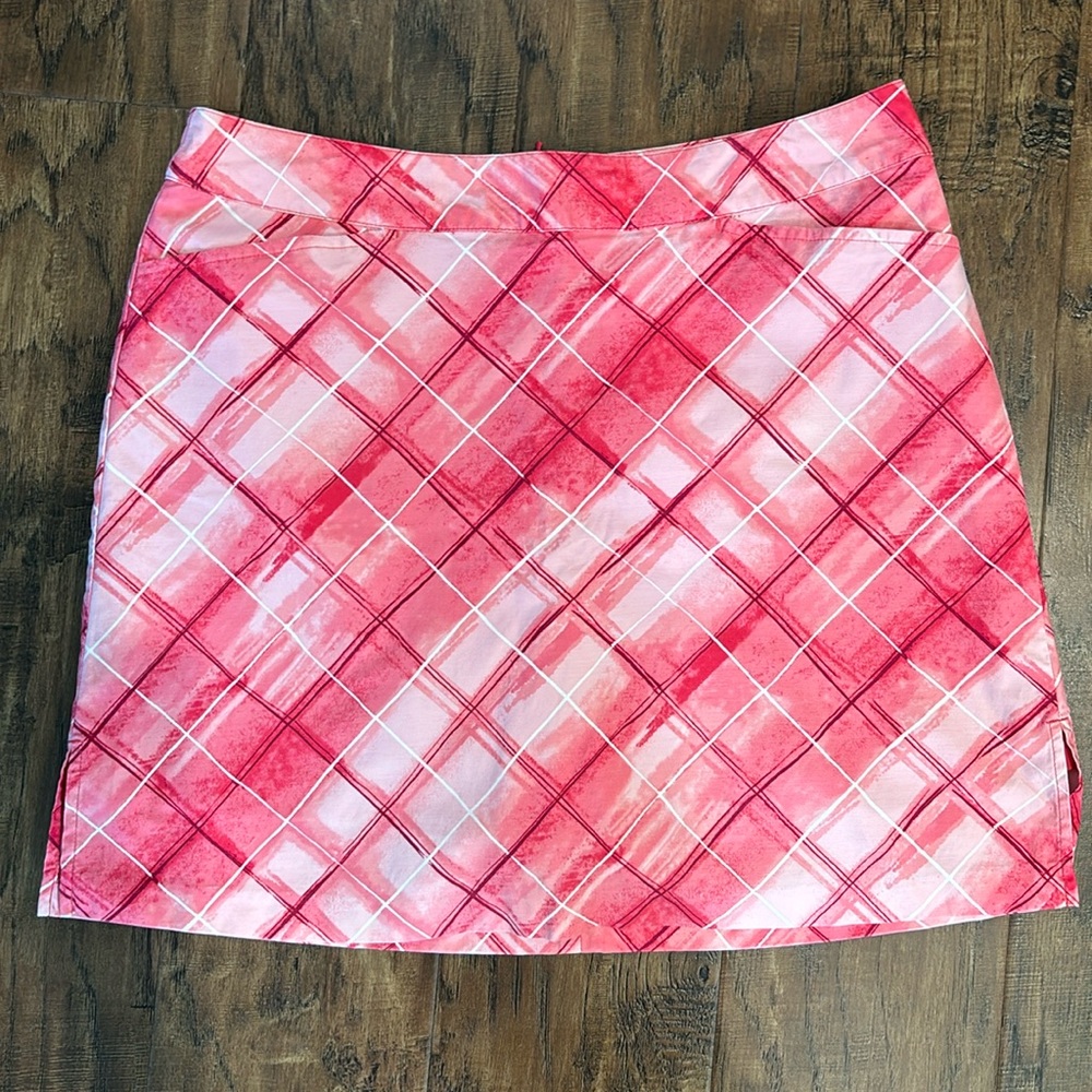 Ativa golf skort. Pink (watermelon) plaid size 12. Front and back pockets.